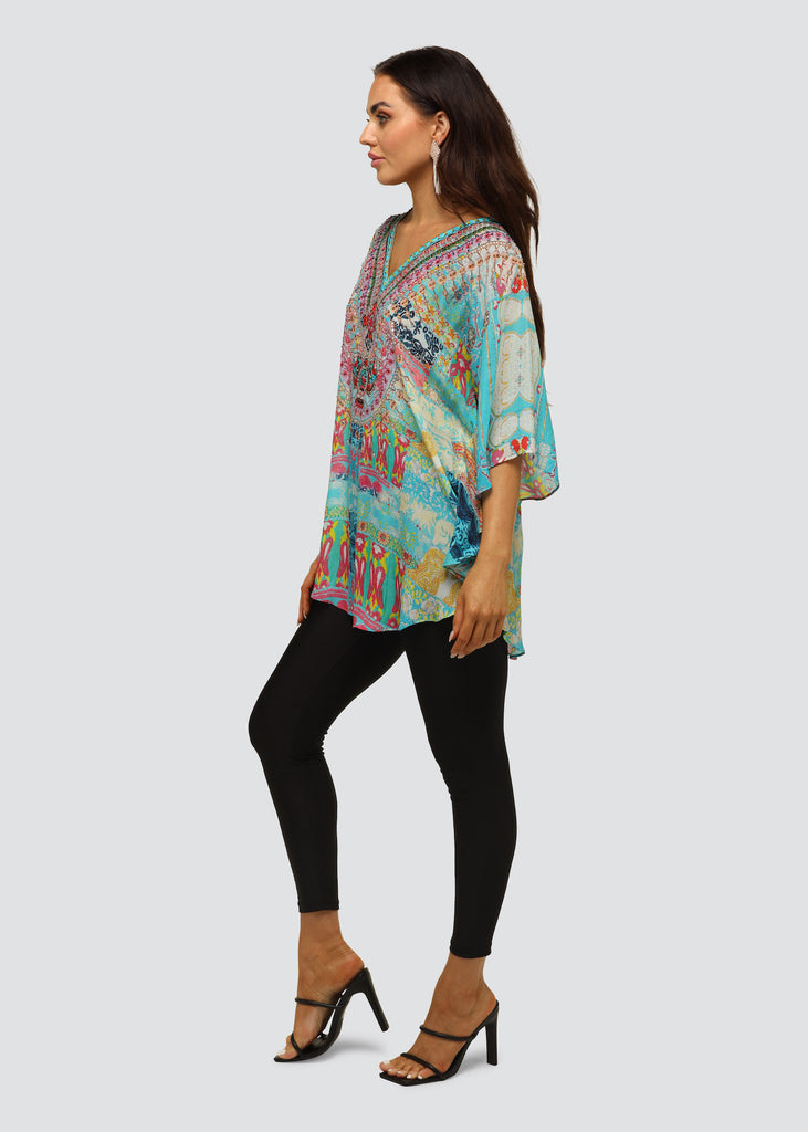 SIDE VIEW OF EMBELLISHED KAFTAN TOP